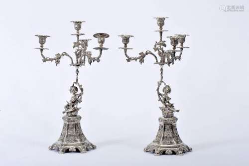 A pair of four-light candelabra