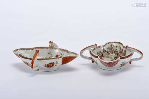 A pair of scalloped sauce boats
