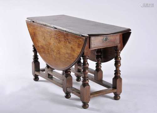 A demi-lune flap table with two drawers