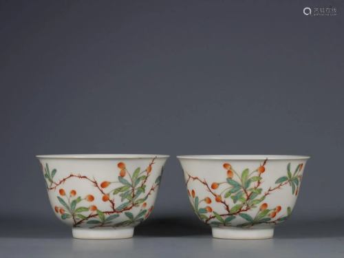 PAIR OF CHINESE FAMILLE ROSE CUPS