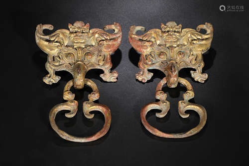 A Pair of Qing Dynasty Gilt Bronze Taotie Mask Door Knocker