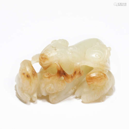 A carved hetian white jade three rams ornament