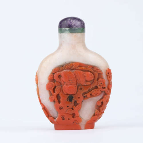 A south red agate prunus and twin-badger snuff bottle