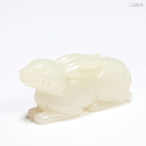 A carved white jade rabbit ornament