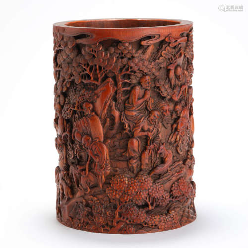 A carved bamboo arhat brush pot