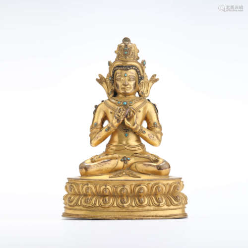 A gilt bronze seated statue of amitayus