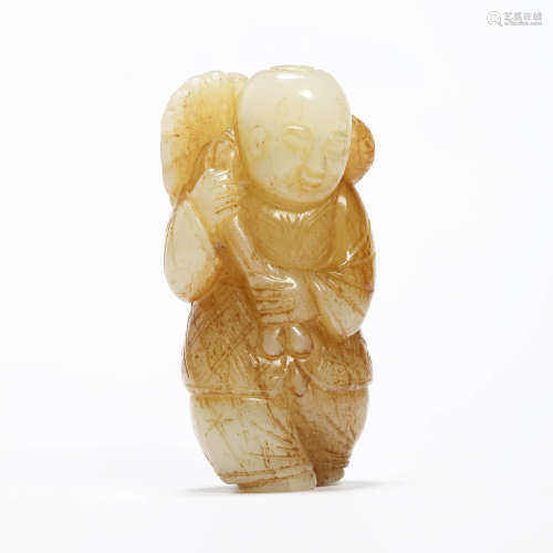 A carved jade child ornament