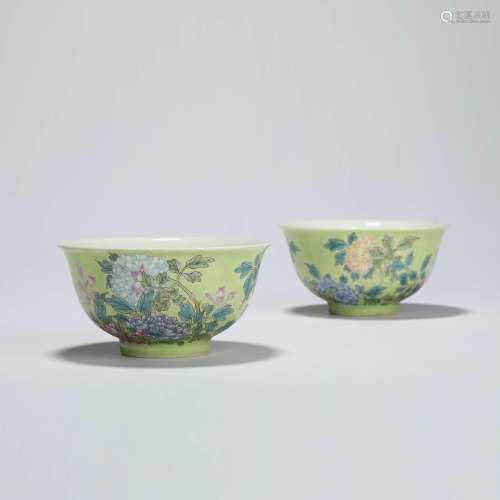 A pair of green-enamel floral bowls