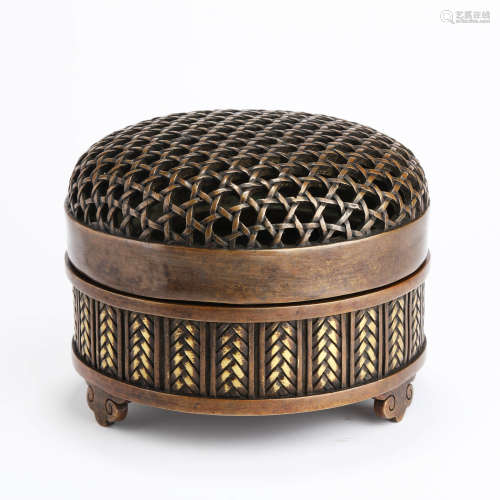 An openwork bronze tripod incense burner with cover