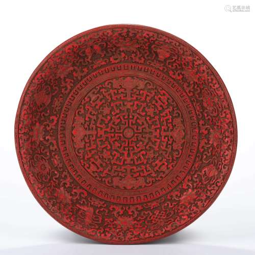 A carved cinnabar lacquer eight treasures dish