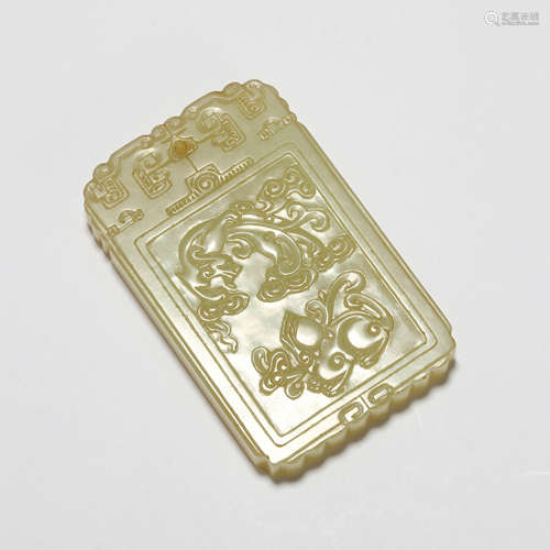 A yellow jade dragon plaque pendant