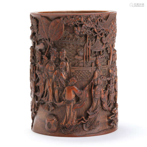 A carved bamboo lady brush pot