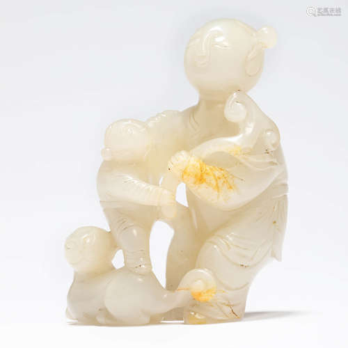 A carved white jade child ornament