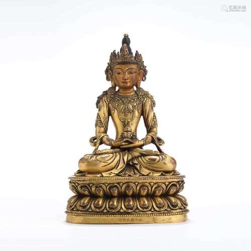 A gilt bronze seated statue of amitayus