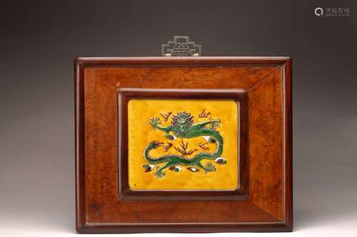 A CHINESE SANCAI 'DRAGON' HARDWOOD WALL PANEL