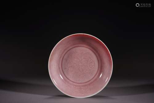 A CHINESE PEACHBLOOM RED GLAZED SAUCER DISH