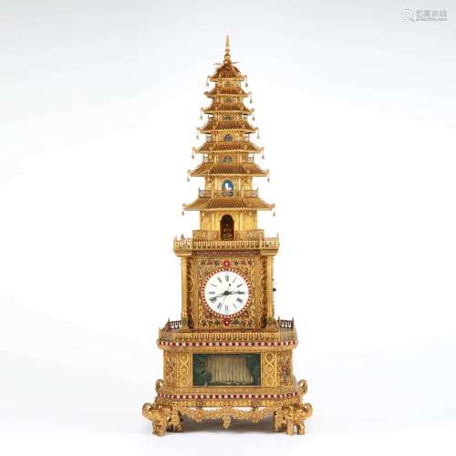 A gilt bronze tower-shaped clock