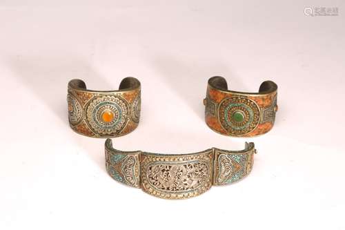 A GROUP OF THREE TIBETAN SILVER CUFF BRACELETS