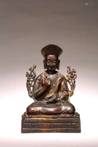 A GILT LACQUERED BRONZE FIGURE OF KAGYU LAMA