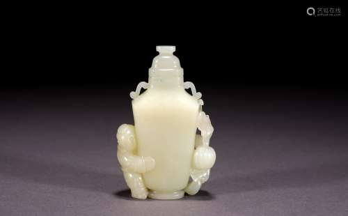 A CHINESE WHITE JADE CARVED 'BOY'S VASE