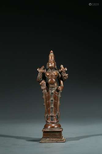 A COPPER ALLOY FIGURE OF STANDING SHIVA