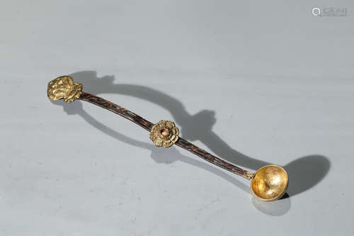 A GILT-BRONZE 'LOTUS' SPOON