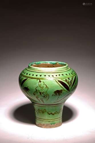 A CHINESE CIZHOU GREEN GLAZED 'BOY' JAR