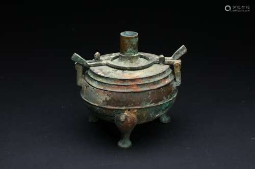 A BRONZE TRIPOD VESSEL AND COVER