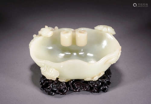 A CHINESE WHITE JADE 'RUYI AND CHI DRAGON' WASHER