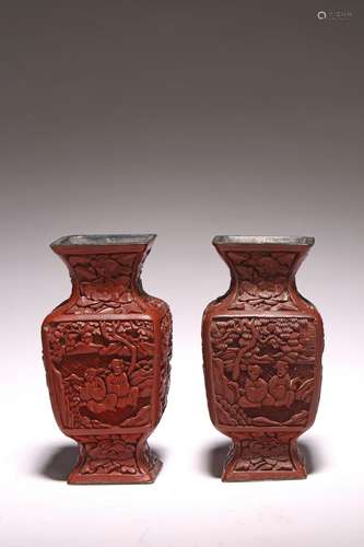 A PAIR OF CINNABAR LACQUER 'FIGURES' VASES