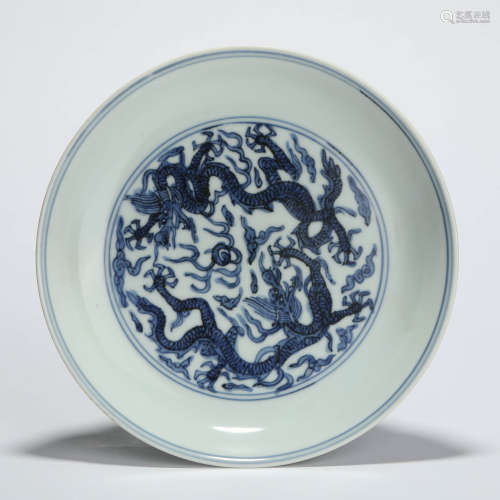 A blue and white dragon dish