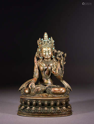 A TIBETAN SILVER FIGURE OF WHITE TARA