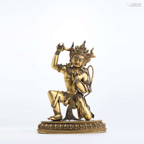 A gilt bronze seated statue of Vajrapani