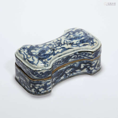 A blue and white ingot-shaped box and cover