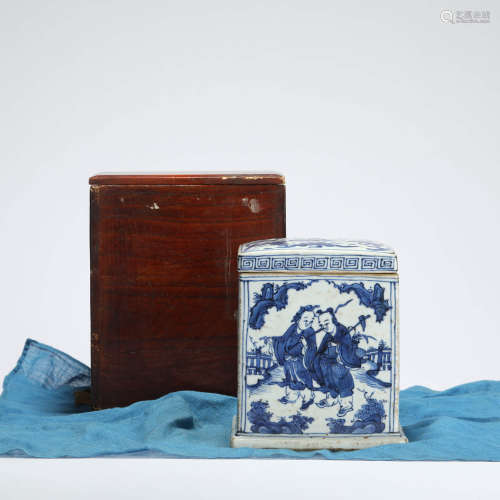 A blue and white figural square jar and cover