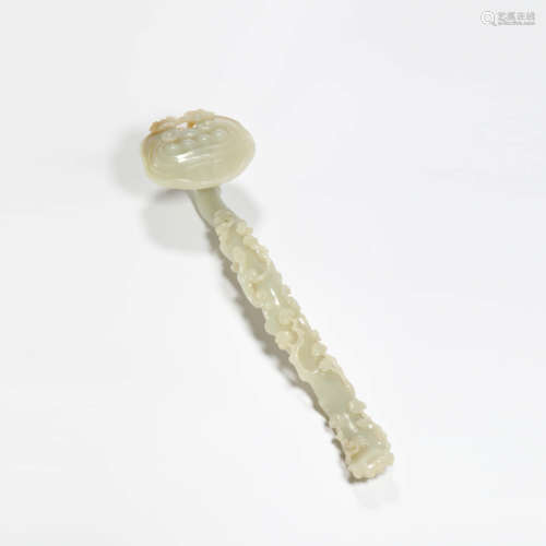 A carved white jade ruyi scepter