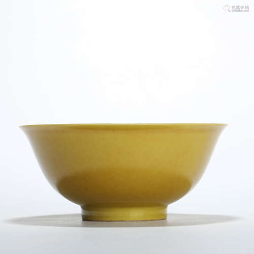 A bright yellow glaze bowl