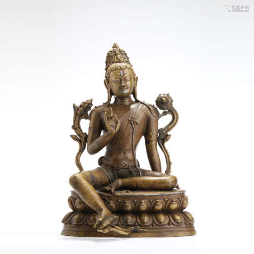 An early bronze seated statue of green tara