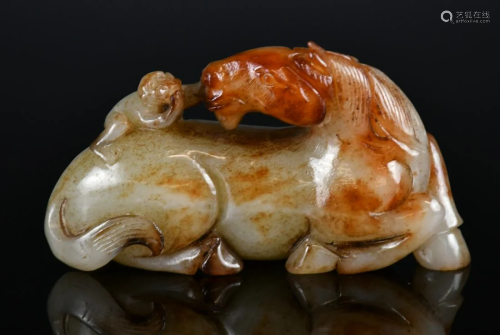 A Celadon Jade Horse and Monkey Group