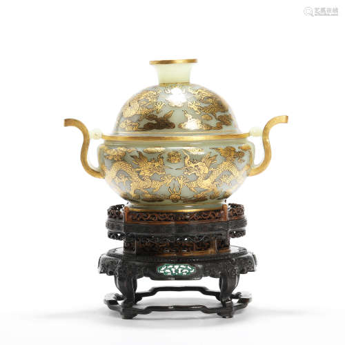 An inlaid jade dragon double-eared incense burner with sanda...
