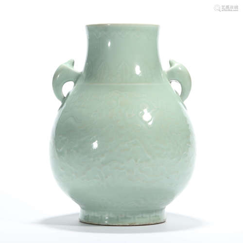 A celadon glaze interlocking lotus beast-eared jar