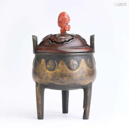 A parcel-gilt bronze tripod incense burner and wood cover
