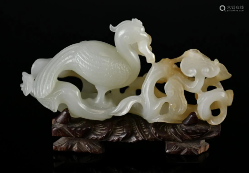 A White Jade Carved 'Phoneix And Lingzhi' w/stand