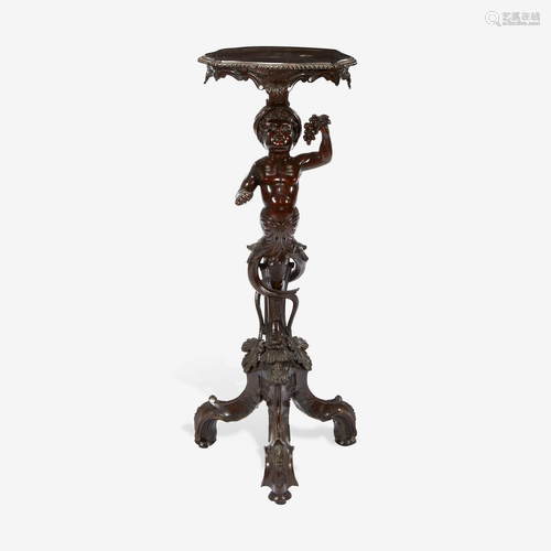 A George II Carved Mahogany Figural Tripod Table First