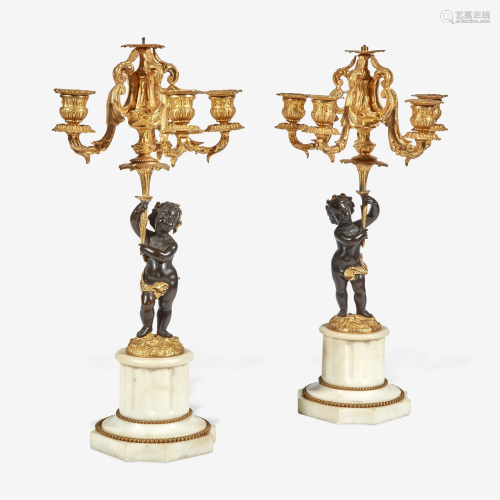 A Pair of Louis XVI Style Gilt and Patinated Bronze