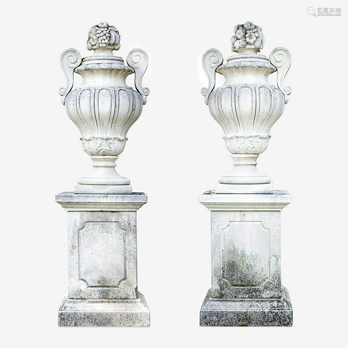 A Pair of Large Composition Stone Garden Urns on