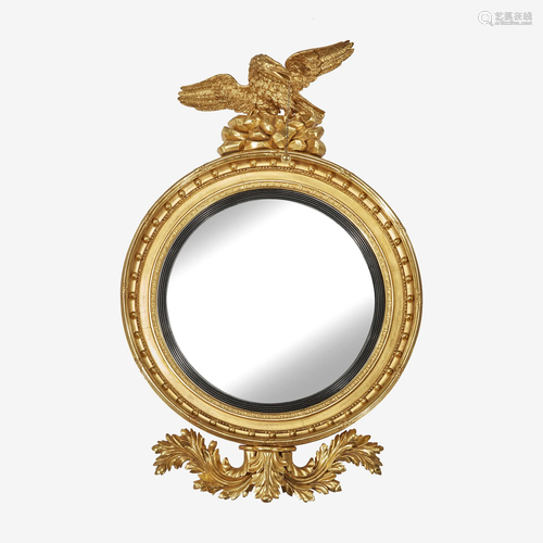 A Large Regency Parcel-Ebonized Giltwood Convex