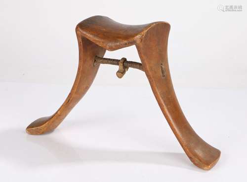 Karamojong headrest, Uganda, the shaped top above a splayed ...