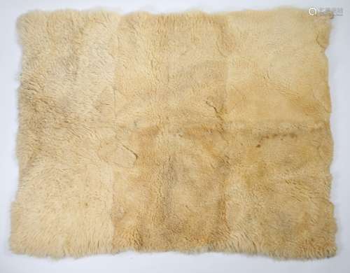 Sweden, a lamb skin wool rug, 20th Century, made of six pane...