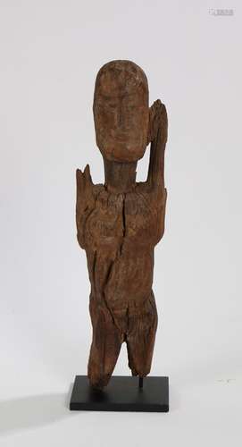 Dogon standing female figure, the head with carved facial fe...